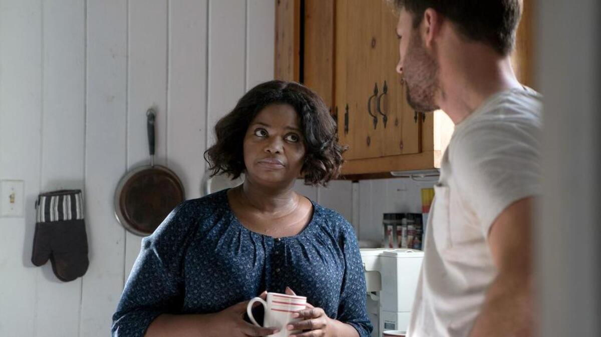 Octavia Spencer as Roberta and Chris Evans as Frank in the film "Gifted." 