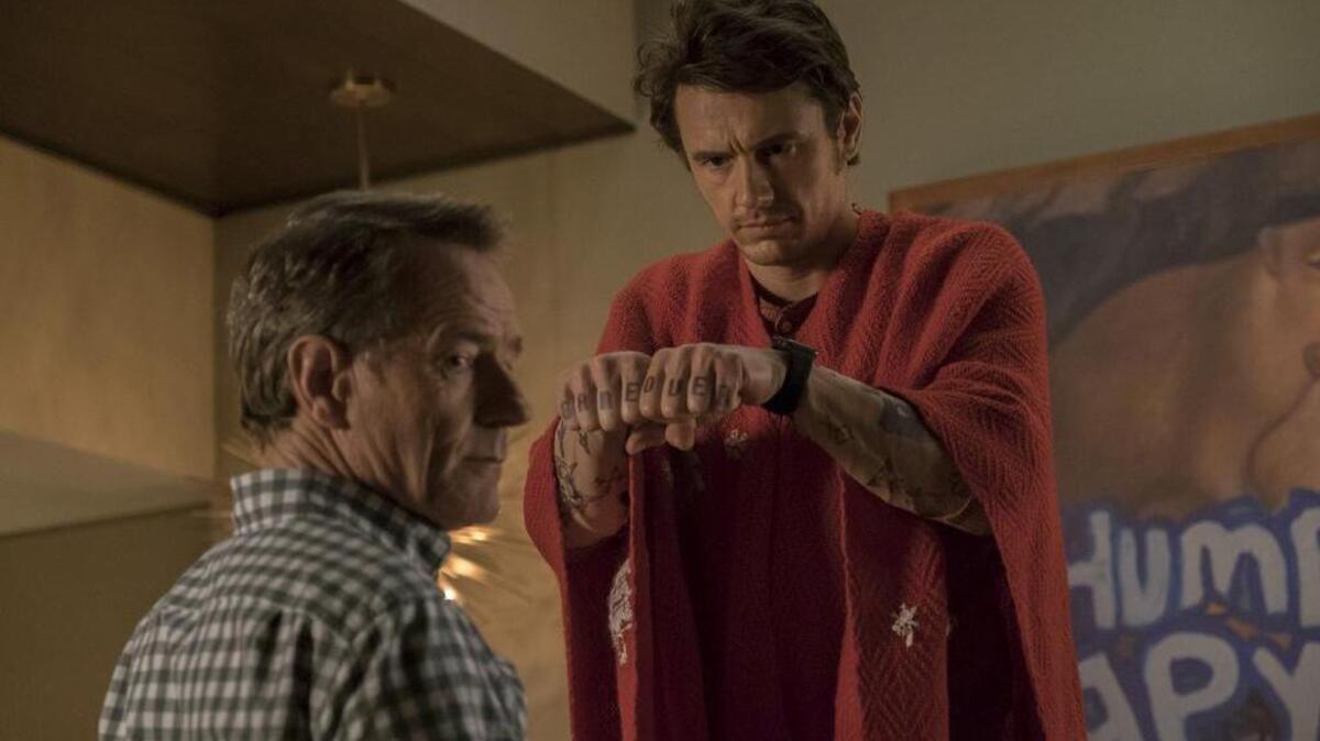 Bryan Cranston’s Ned, left, doesn’t understand or like his daughter’s techie boyfriend played by James Franco in the comedy “Why Him?”