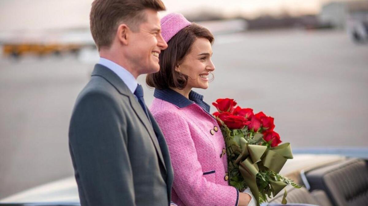 Caspar Phillipson as John F. Kennedy and Natalie Portman as Jackie Kennedy arrive in Dallas in “Jackie.”