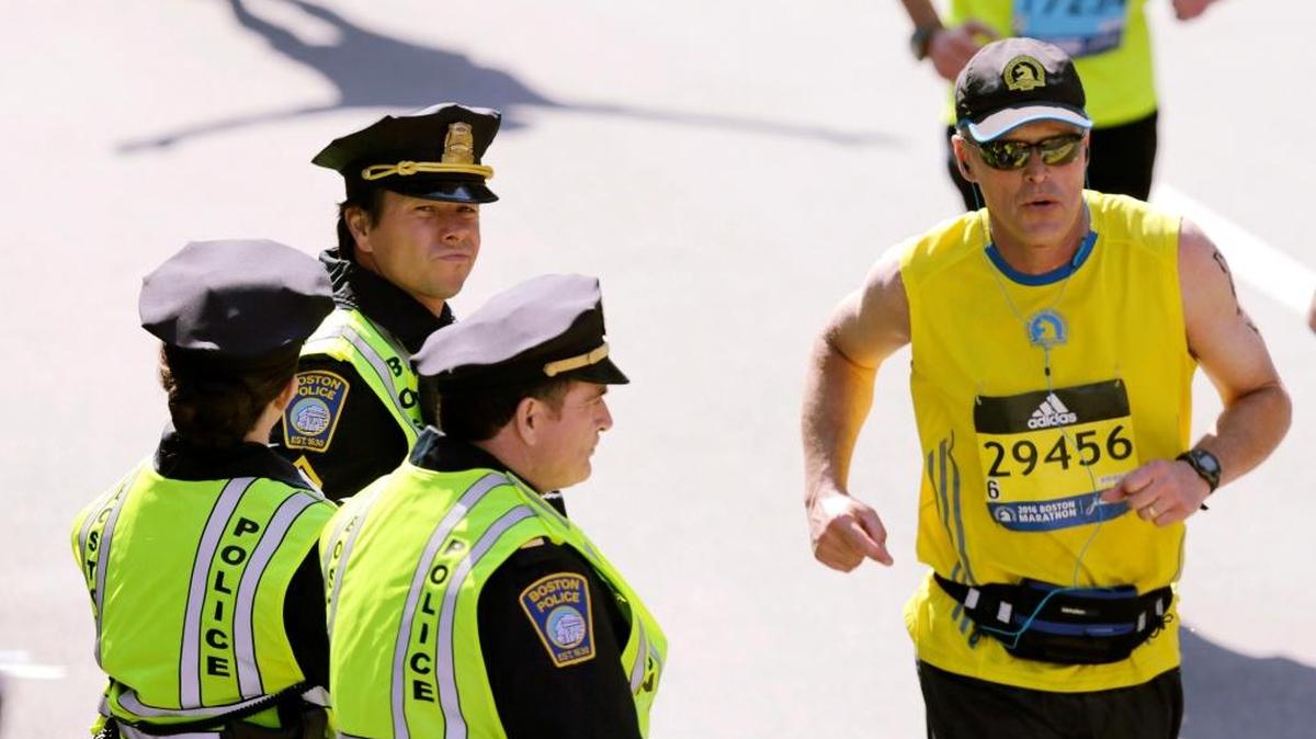 Mark Wahlberg (center left) plays a policeman working near the finish line of the Boston Marathon.