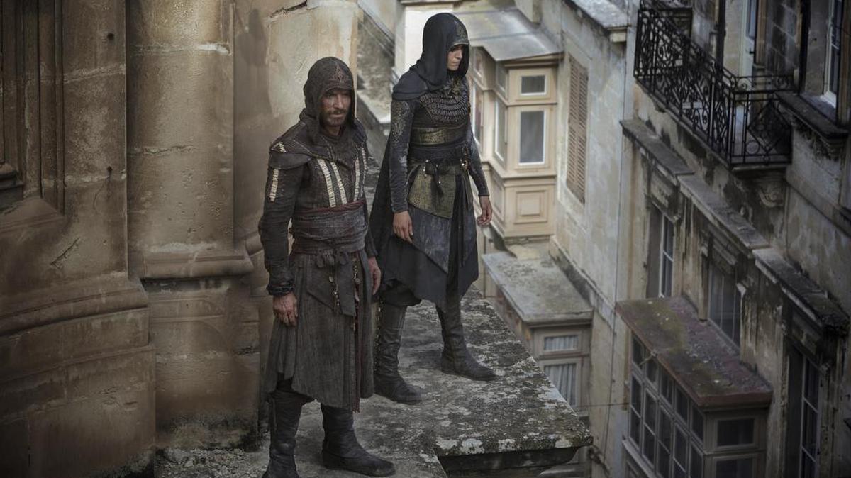Michael Fassbender, left, is Callum Lynch and Ariane Labed is Maria in a scene from “Assassin’s Creed.”