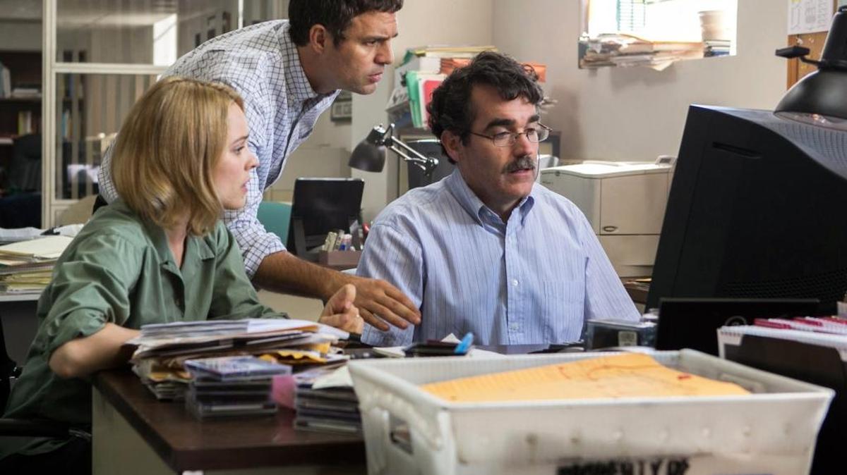 Rachel McAdams, from left, as Sacha Pfeiffer, Mark Ruffalo as Michael Rezendes and Brian dArcy James as Matt Carroll, in a scene from the film, “Spotlight.”