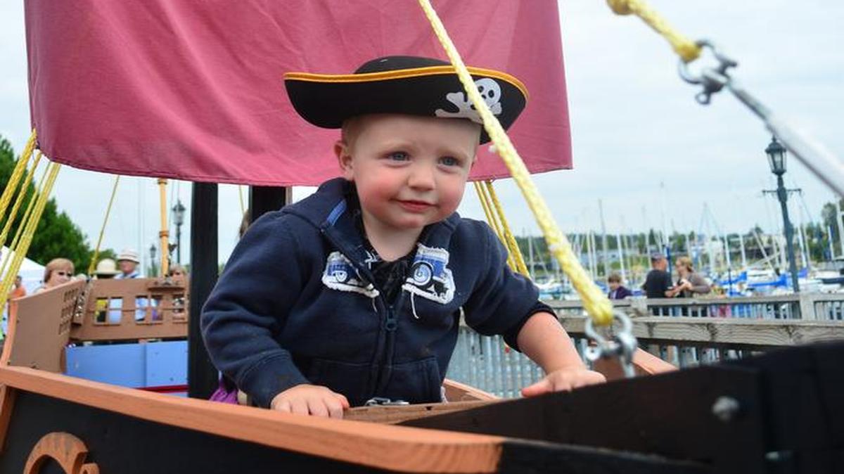 
Drayton Simpson, then 2, looks over the bow of a float at the 2013 Drayton Harbor Days Maritime Festival in Blaine. This year’s event is Aug. 1-2.
