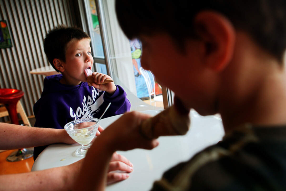Peyton Manos, 7, left, and Gabe Sherman, 8, lick their ice cream cones at Mallard Ice Cream, 1323 Railroad Ave. in Bellingham.