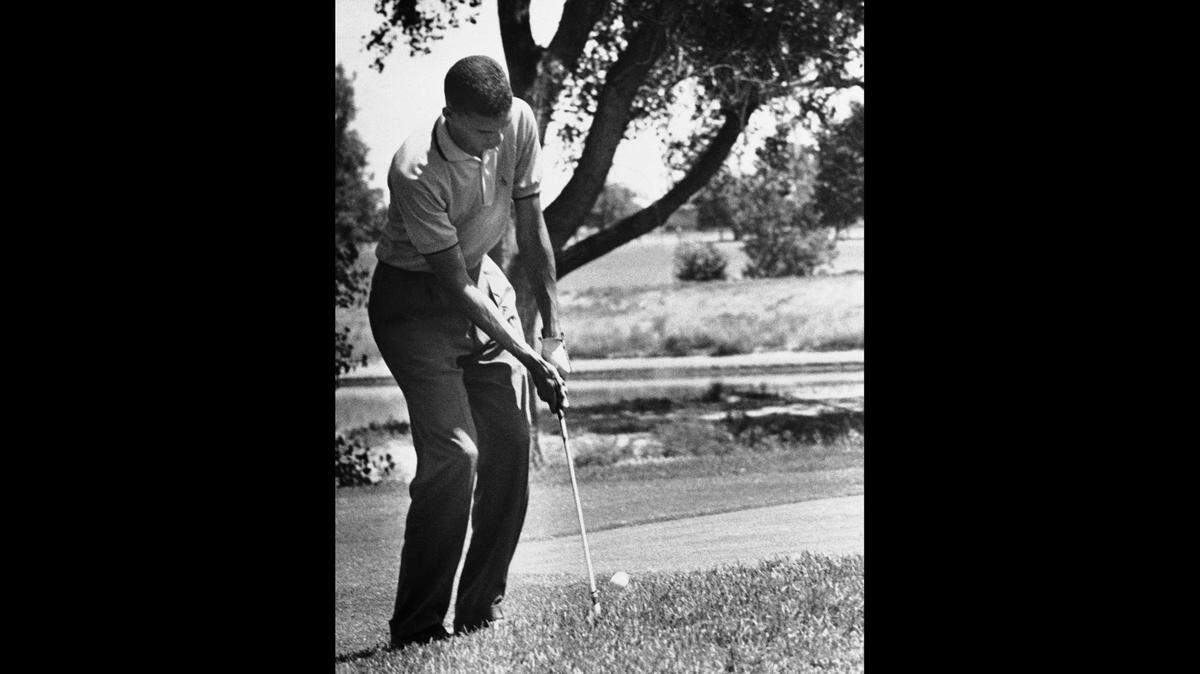Bill Wright chips onto the 11th green in the semi-finals of the National Public Links Golf Championship in Denver, July 18, 1959. Wright went on to win the championship, becoming the first Black man to win a major U.S. golf title. Wright, who is a Western Washington University Athletics Hall of Famer, died Friday at 84.