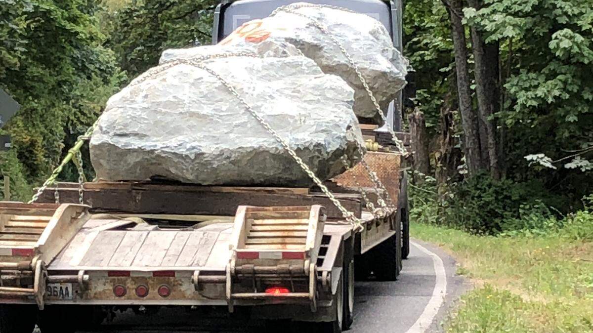 A truck delivers large rocks to the Bellingham Shipping Terminal Wednesday. The rocks, from local quarries, will be used to repair a jetty on the Columbia River.