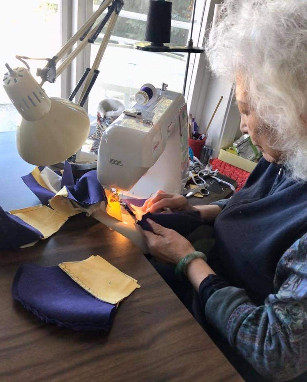 Ervena Yu sews homemade, protective masks. Yu and her family donated more than 100 of the masks St. Joseph hospital in Bellingham in memory Dr. Ming Ho Yu, and more masks are being sold to benefit a scholarship at WWU’s Huxley College.