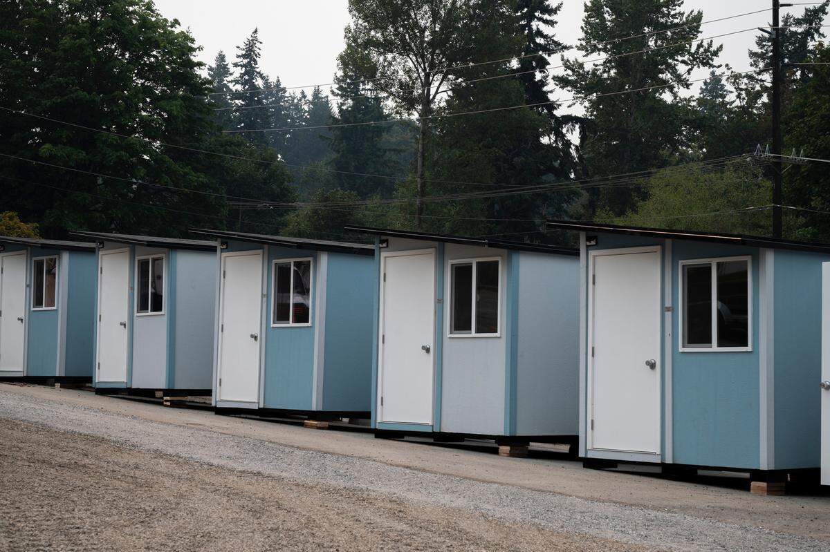 New tiny homes sit at the new Gardenview Village on the corner of Lakeway Avenue and Woburn Street Friday, Aug. 13, in Bellingham.