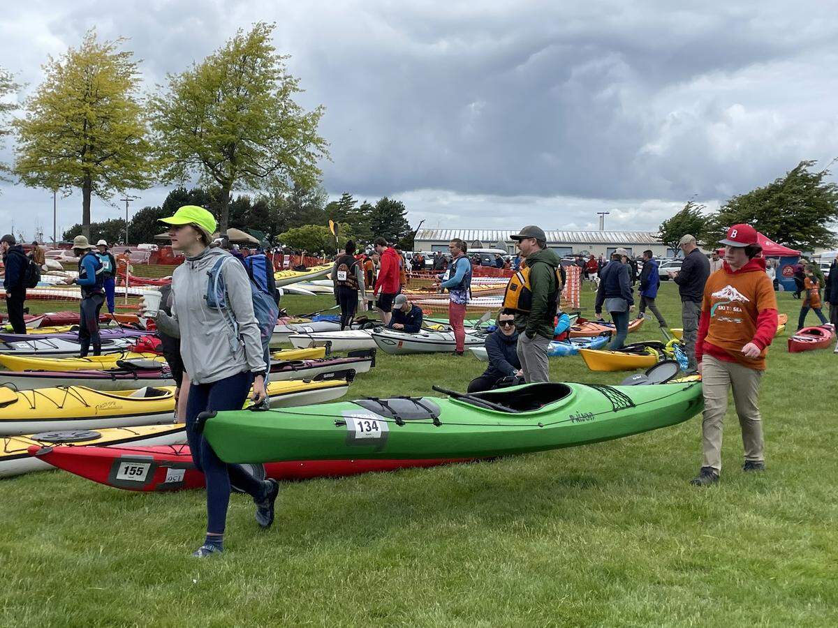 Kayakers line up at Zuanich Park before the safety meeting for the kayak leg of the Ski to Sea race on Sunday, May 29.