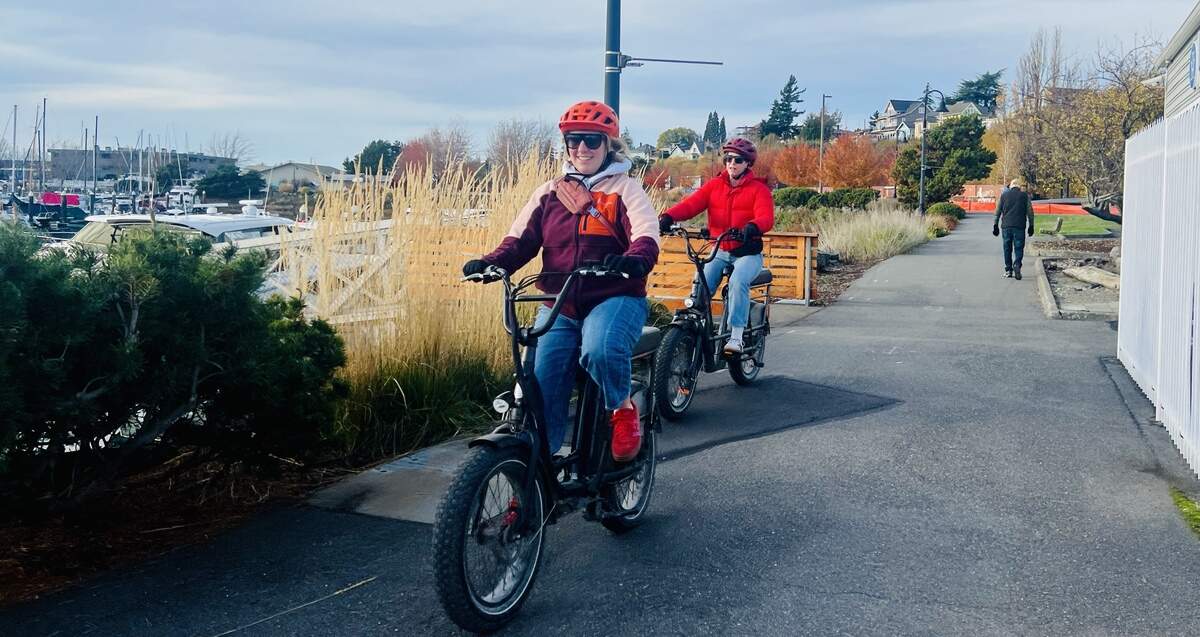 E-bike riders enjoy a sunny on a trail along Squalicum Harbor in Bellingham on Nov. 9.