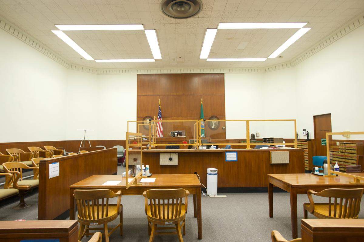 Whatcom County Superior Court courtrooms on Friday, March 5, feature barriers to enforce COVID-19 precautions as jury trials resume in Bellingham.