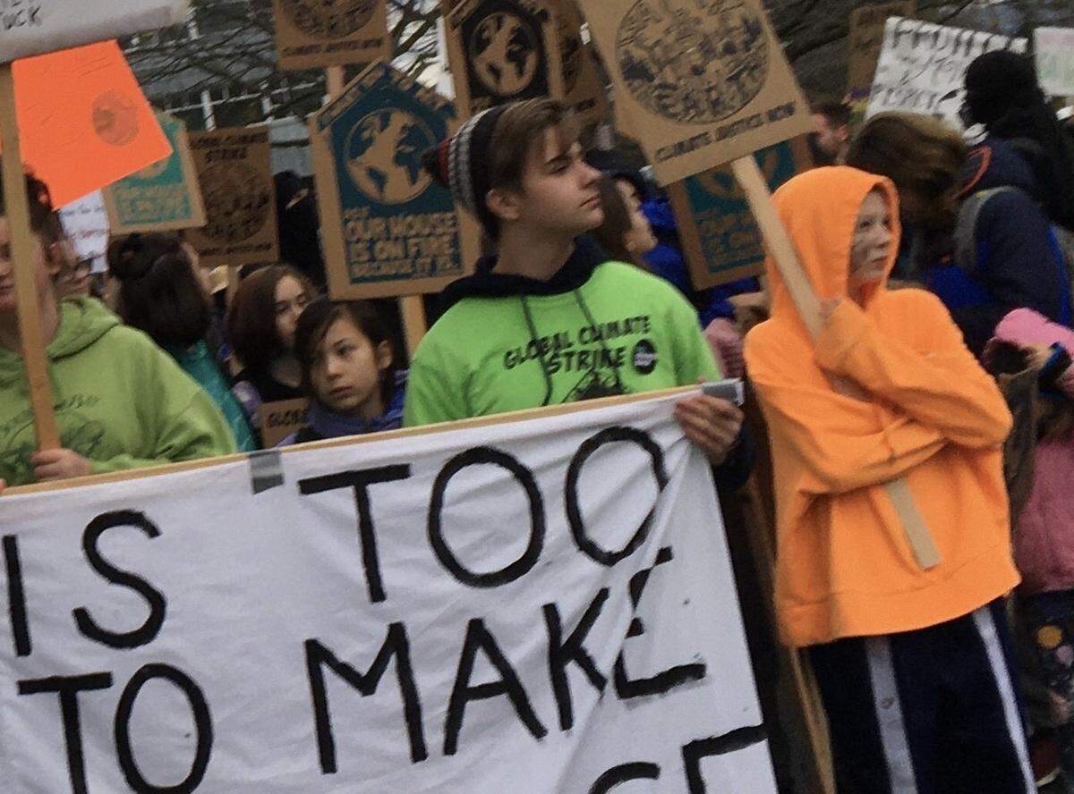 Tanner Rapp, center, at the Bellingham Youth Climate Strike rally and march on Dec. 6. Rapp addressed the Bellingham City Council on Dec. 9, when it took public comment on the recommendations issued by the city’s Climate Task Force.