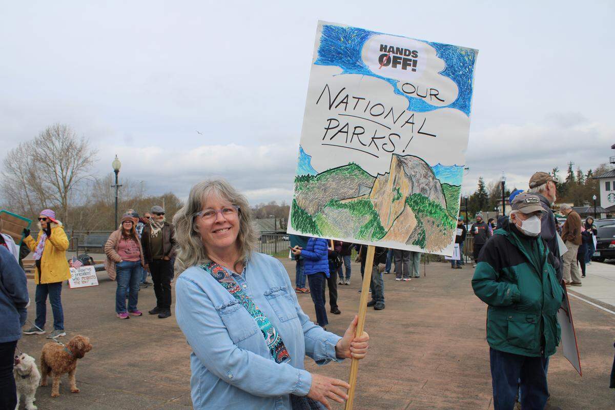 Jill Wingfield holds her handdrawn sign at the ‘No Kings’ protest in Blaine. The nationwide day of action is in opposition of the Trump administration and its actions.