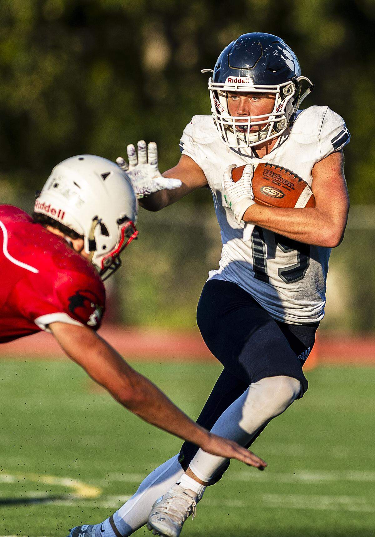 Lynden Christian wide receiver Bryce Bouwman evades Bellingham cornerback Morgan Cavalier Sept. 6 at Civic Stadium. Bouwman, along with Eli DenBleyker and Zach Sipma, has made unexpected contributions to the Lynden Christian football team’s run to the Class 1A state championship game. The Lyncs face Royal Saturday in Lakewood.