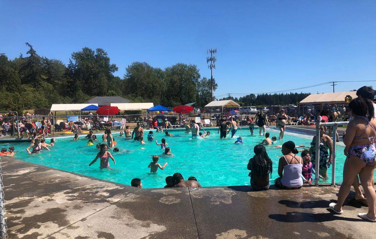 Families enjoy the activity pool at Birch Bay Waterslides Saturday, Aug. 6, 2022, in Blaine, Wash.