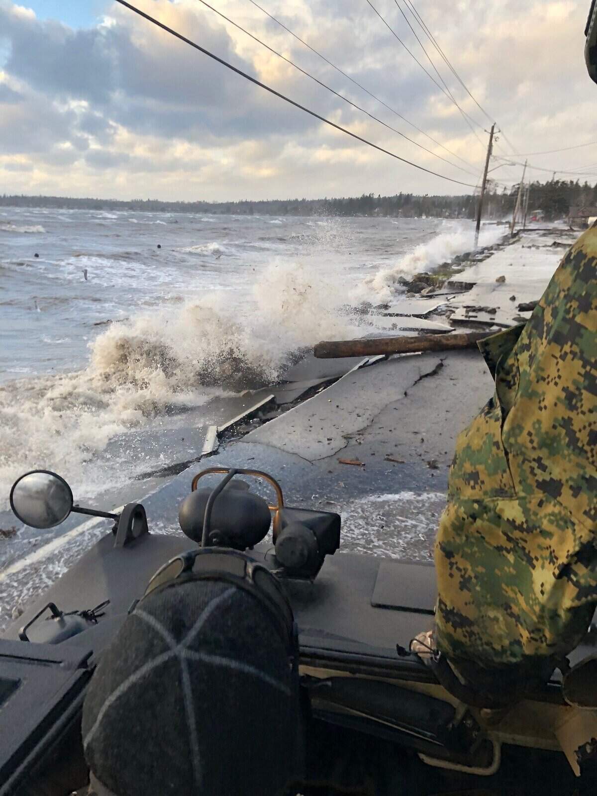 High tide and a windstorm combined Thursday, Dec. 20, 2018, to flood Birch Bay Drive along the bay in northern Whatcom County, Wash.