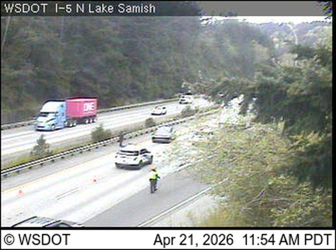 A collision between a bicyclist and two vehicles on Interstate 5 has resulted in at least one injury and both northbound lanes blocked north of the Samish Way exit.