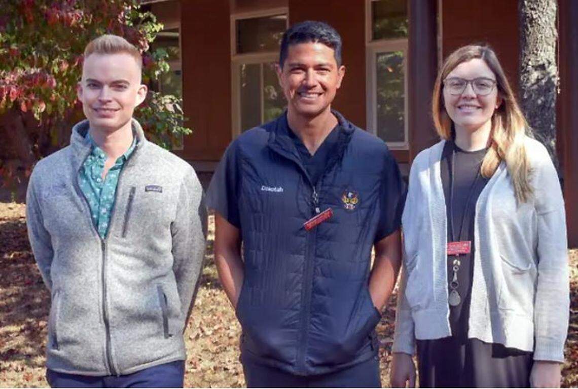 Medical student Jason Finkbonner, left, stands with Drs. Dakotah Lane and Zoe Taylor at the Lummi Tribal Health Center in Whatcom County.