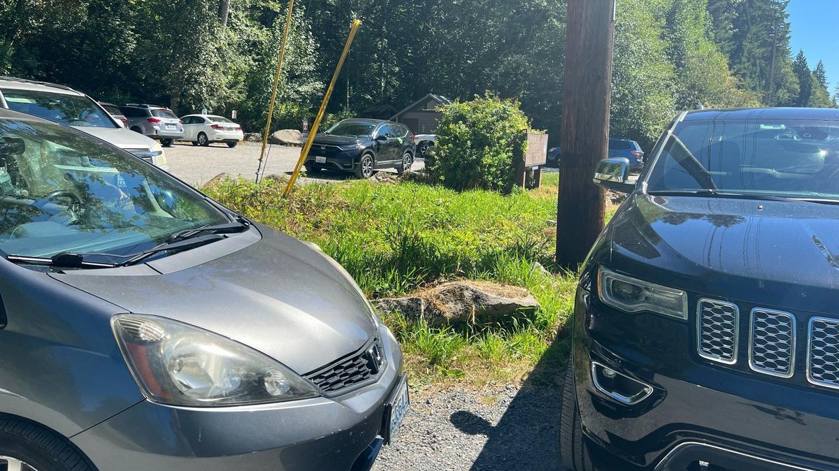 Cars are parked haphazardly on Aug. 13 at the Stimpson Family Nature Reserve east of Bellingham. A paving project in mid-2024 will add spaces and reduce confusion for park visitors.