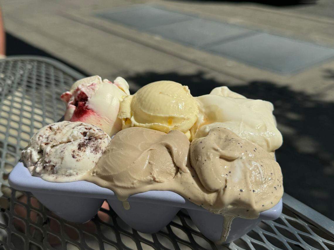 An ice cream flight from Acme Valley Ice Cream with lemon blueberry, orange cream, salted caramel, mint chip, root beer and espresso ice cream scoops.