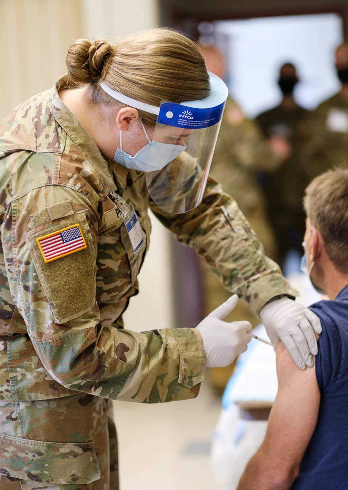 Washington National Guard members provide COVID-19 vaccinations at a mobile clinic that visited independent and senior living communities in Bellingham the week of March 8. The Washington State Department of Health, the Washington National Guard, and Whatcom County Health Department partnered to bring the mobile vaccination team to Whatcom County, focusing on high-risk individuals with difficulty accessing other vaccine providers.