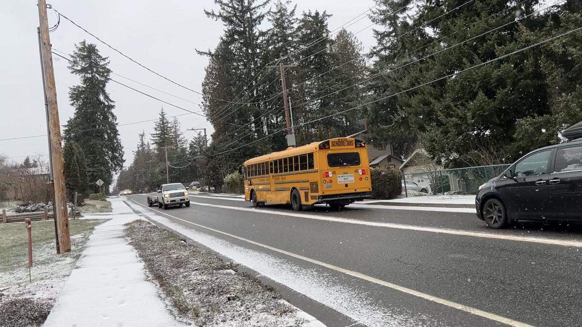 Light snow falls along Cable Street in the Geneva neighborhood east of Bellingham on Wednesday morning, Feb. 22. Temperatures in Western Washington were about 15 to 20 degrees below the normal high of 50 for the date.