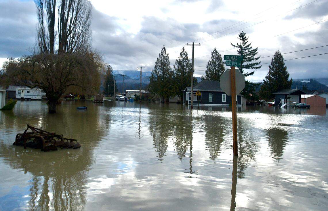 Neighborhoods in Sumas remain flooded Monday.