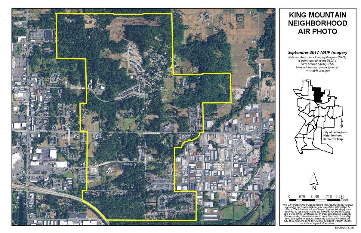 An aerial photo shows the King Mountain neighborhood and its relatively undeveloped land.