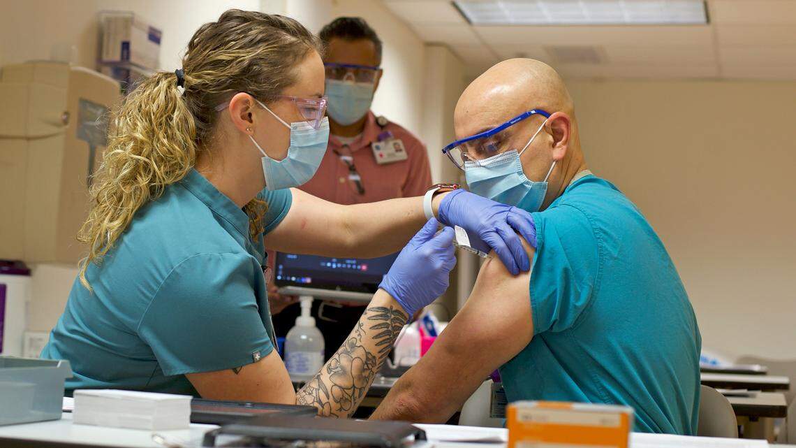 ’Today marks a day of hope’ as COVID vaccinations begin with St. Joseph nurse, doctor
