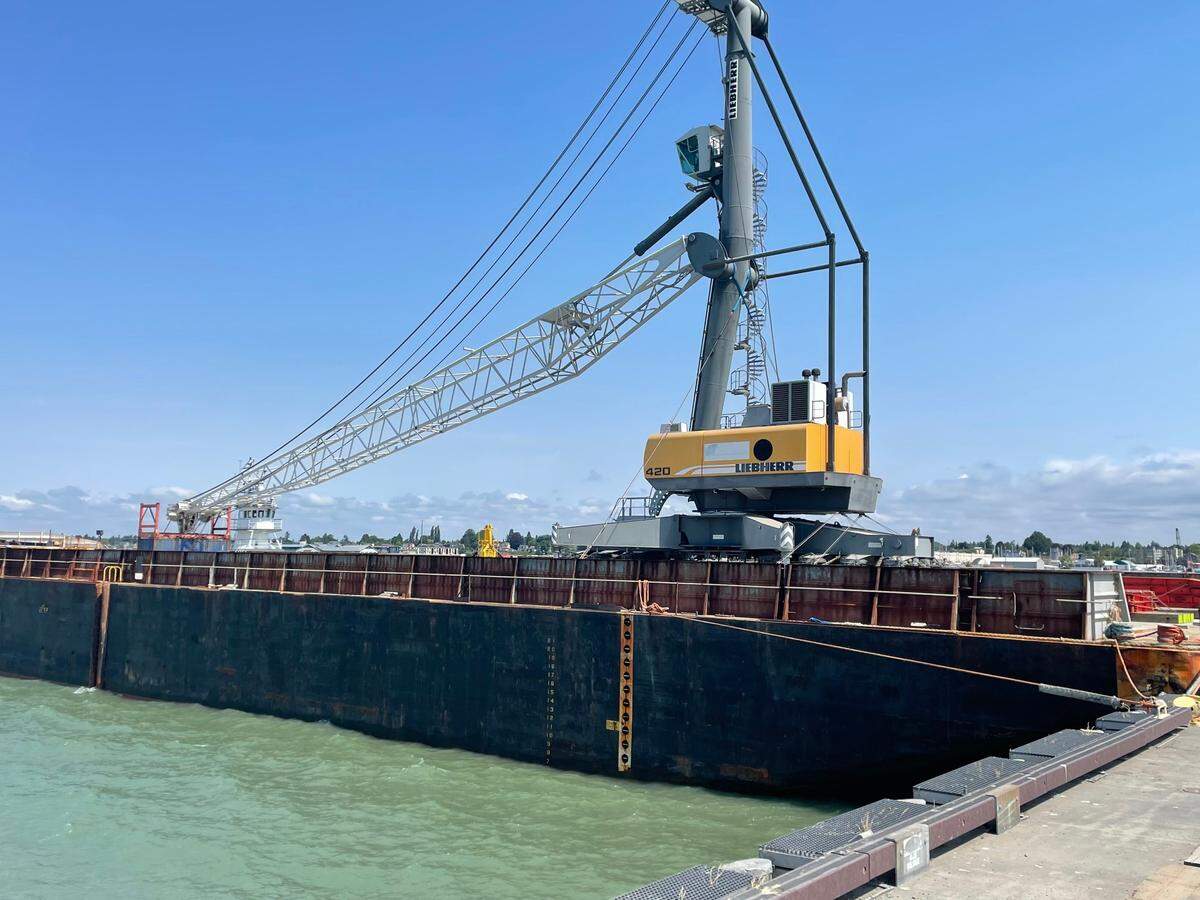 A Liebherr Harbor Crane, which has a lifting capacity of 120 tons and a reach of 157 feet, arrived by barge at the shipping terminal on Cornwall Avenue near Waypoint Park Thursday, July 8, in Bellingham. The 817,915 pound-crane was shipped from California to Bellingham after it was declared surplus by the Port of West Sacramento.