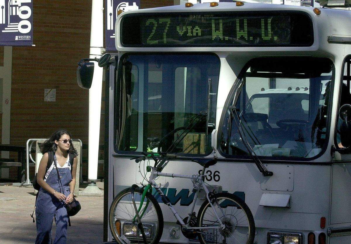 A passenger boards a bus bound for Western Washington University at the downtown Bellingham station.