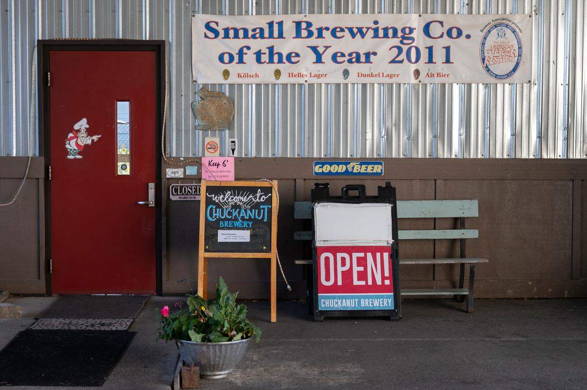A banner displays awards received by the Chuckanut Brewery, on Tuesday, Sept. 28, at 601 W. Holly St. in Bellingham. The longtime brewery announced that it will close its Bellingham operations in mid-October.