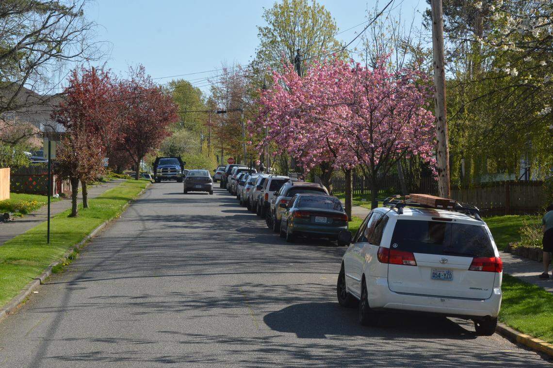 Cars line Franklin Street looking toward Lakeway Drive on a weekday afternoon, a testament to parking issues prevalent throughout the York neighborhood. Few homes have driveways, although many have off-street parking in alleys.