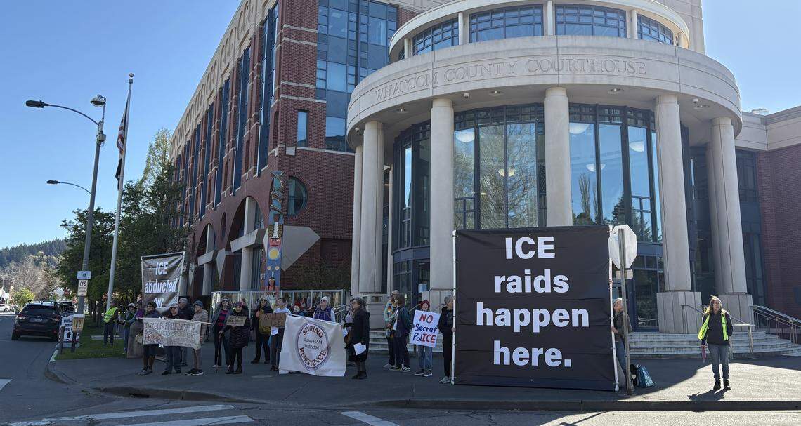 Singing Resistance Whatcom gathered outside the Whatcom County Courthouse in Bellingham to protest federal immigration enforcement in the area on April 16, 2026.