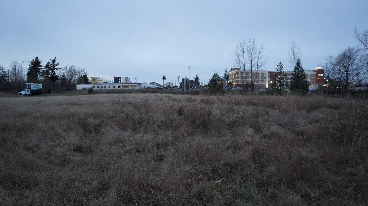 An empty lot near Home Road in Bellingham is the proposed site of a multi-family residential development that could break ground by the fall of 2023.