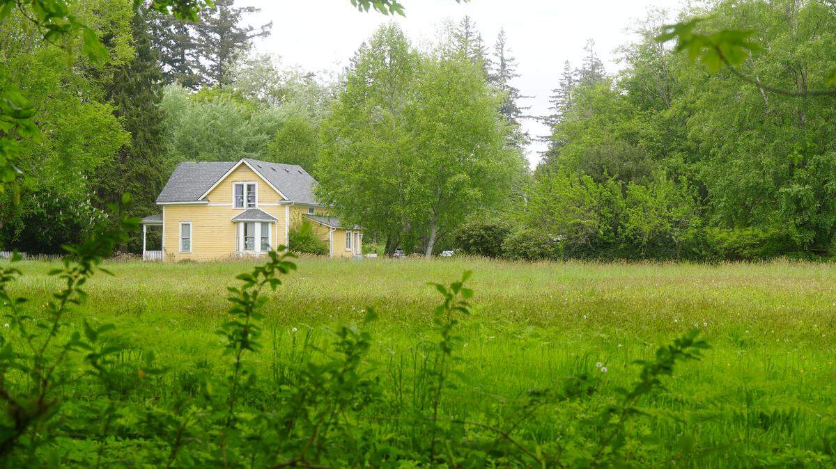 A farmhouse sits on a 4.5-acre property in the Samish neighborhood on the corner of 40th Street and Wilkin Street, just northwest of Lake Padden on May 8, 2026, in Bellingham, Wash. A 29-unit subdivision development is proposed for the site that would include a mix of townhomes and detached, single-family homes.