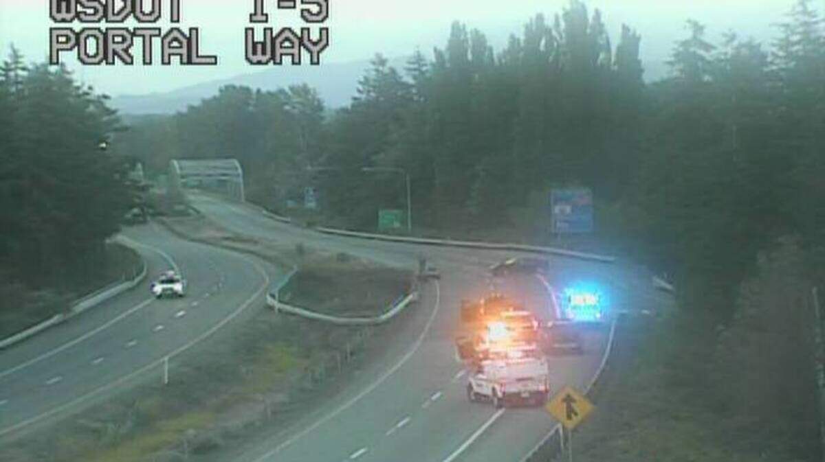 A Washington State Department of Transportation camera captures this image of a fatal crash scene early Friday. Aug. 16, 2024, on southbound Interstate 5 at Portal Way near Ferndale, Wash.