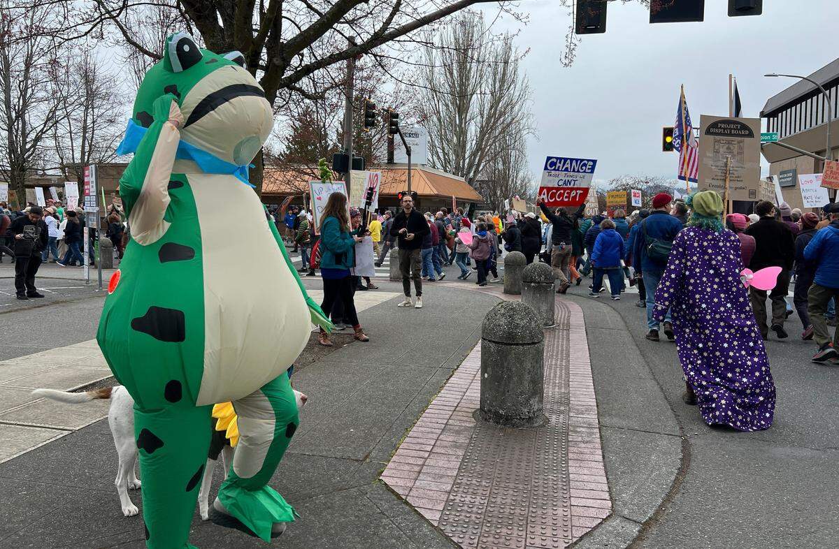After a gathering at Bellingham’s waterfront, people marched through downtown Bellingham as part of a No Kings event.