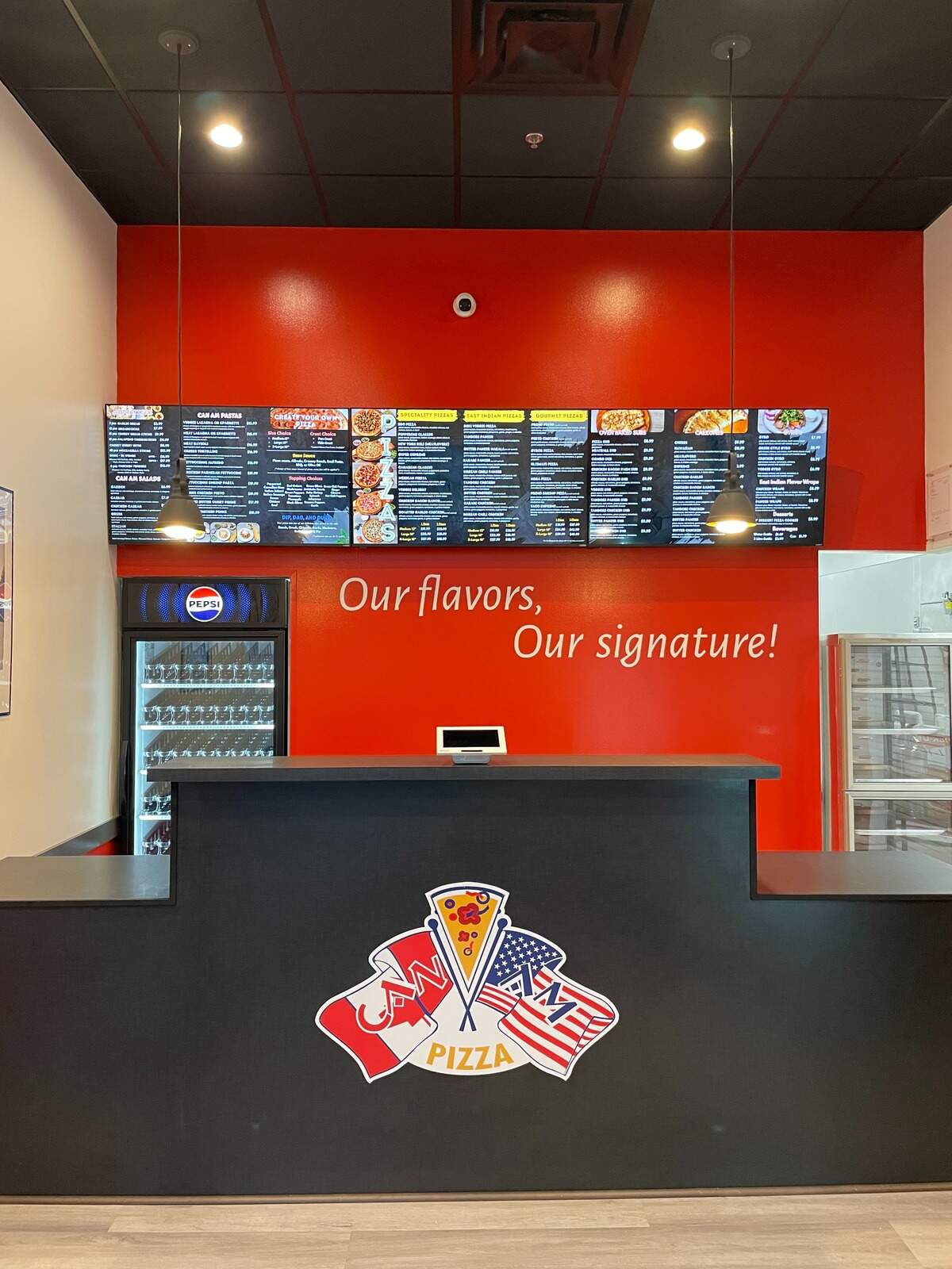 The interior of Can Am Pizza.