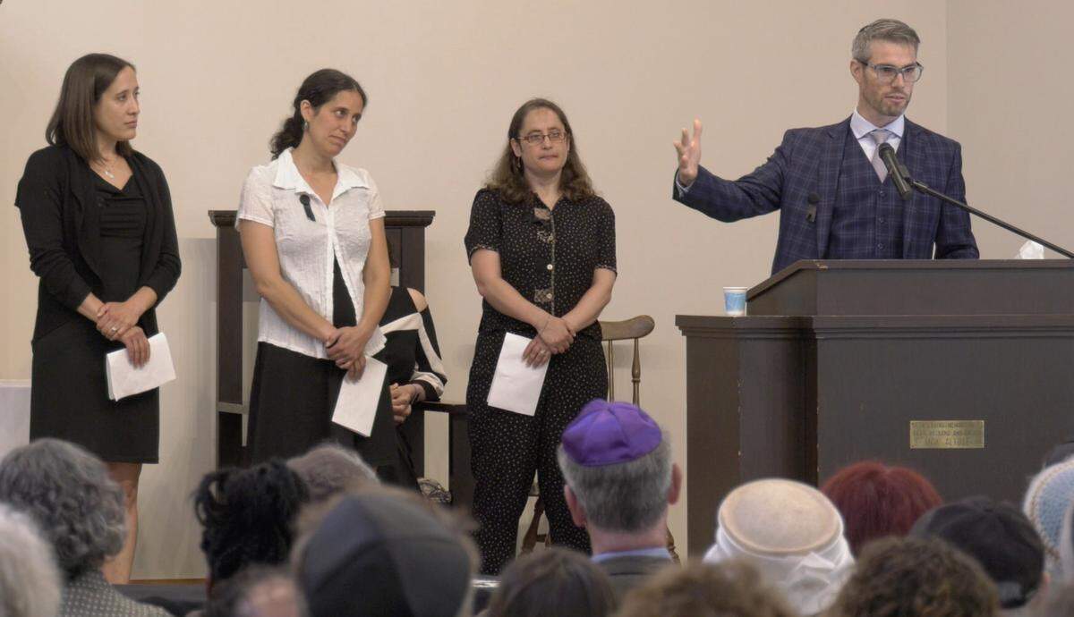 Grandchildren of Holocaust survivor Noémi Ban speak during her memorial service at Congregation Beth Israel in Bellingham Tuesday. Ban died June 7.