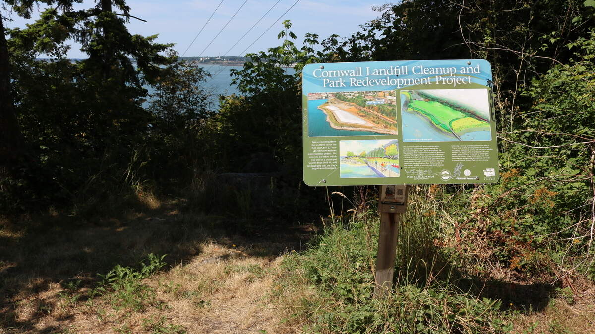 A sign on the South Bay Trail Monday, July 12, outlines the Cornwall Beach Park project that has been in the works for years. The project involves the cleanup of two sites, the Cornwall Avenue Landfill site and the R.G. Haley site.