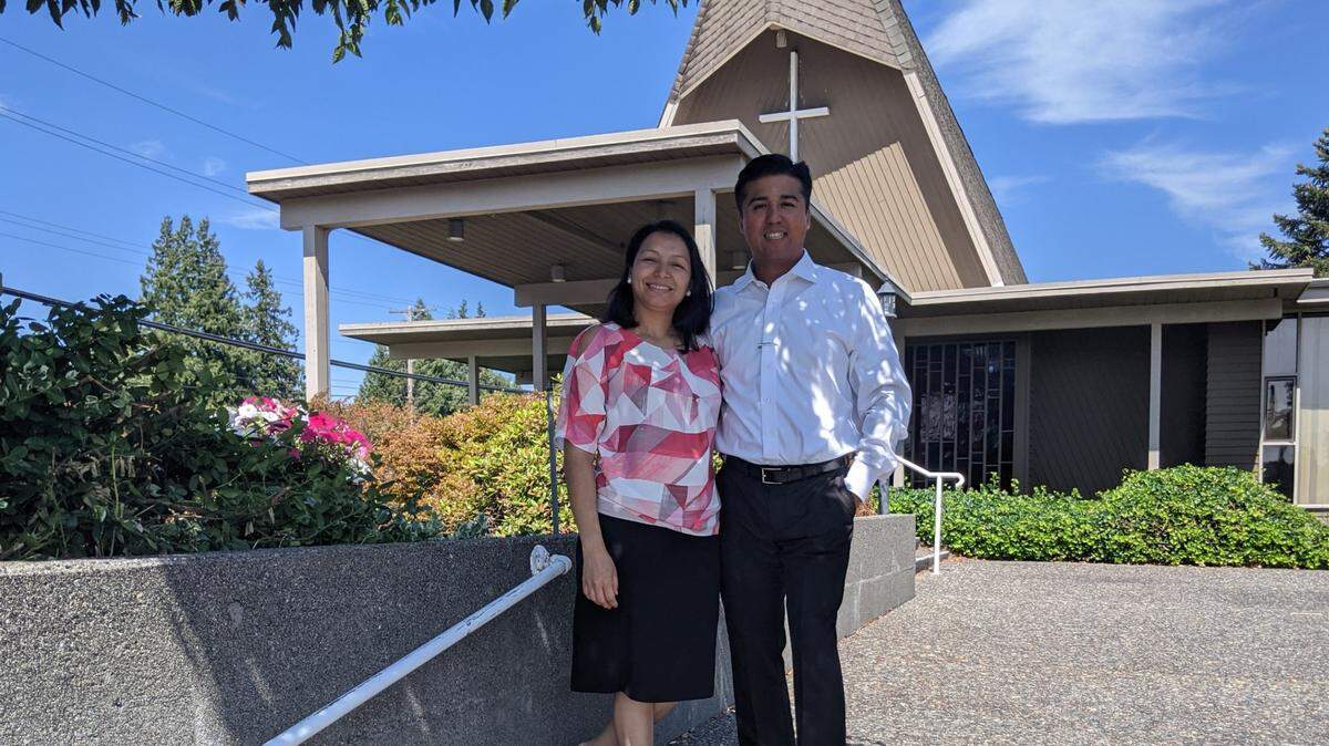 Edward and Dina Reyes stand outside of Hope Lutheran Church in Lynden on Sunday, July 4, where they will hold services for their Spanish-language evangelical church, Iglesia de Toda Nacion.