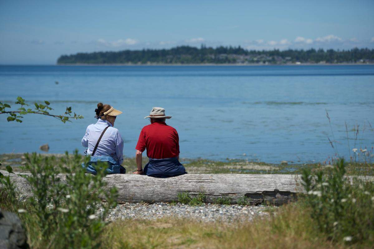 People enjoy the view of the water at Birch Bay State Park on Wednesday, June 17, in Blaine. 