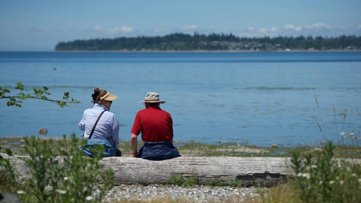 People enjoy the view of the water at Birch Bay State Park on Wednesday, June 17, 2021, in Blaine, Wash.