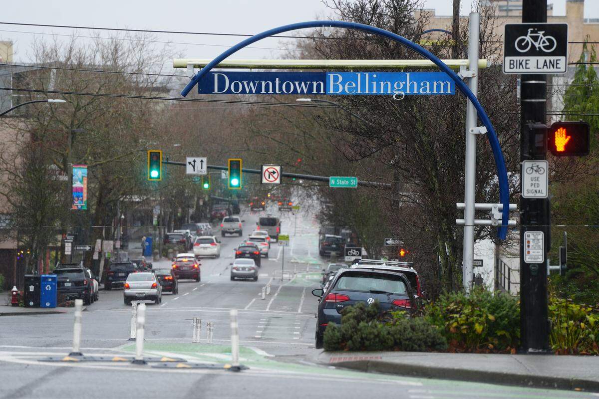 A sign welcomes people to downtown Bellingham, Wash.