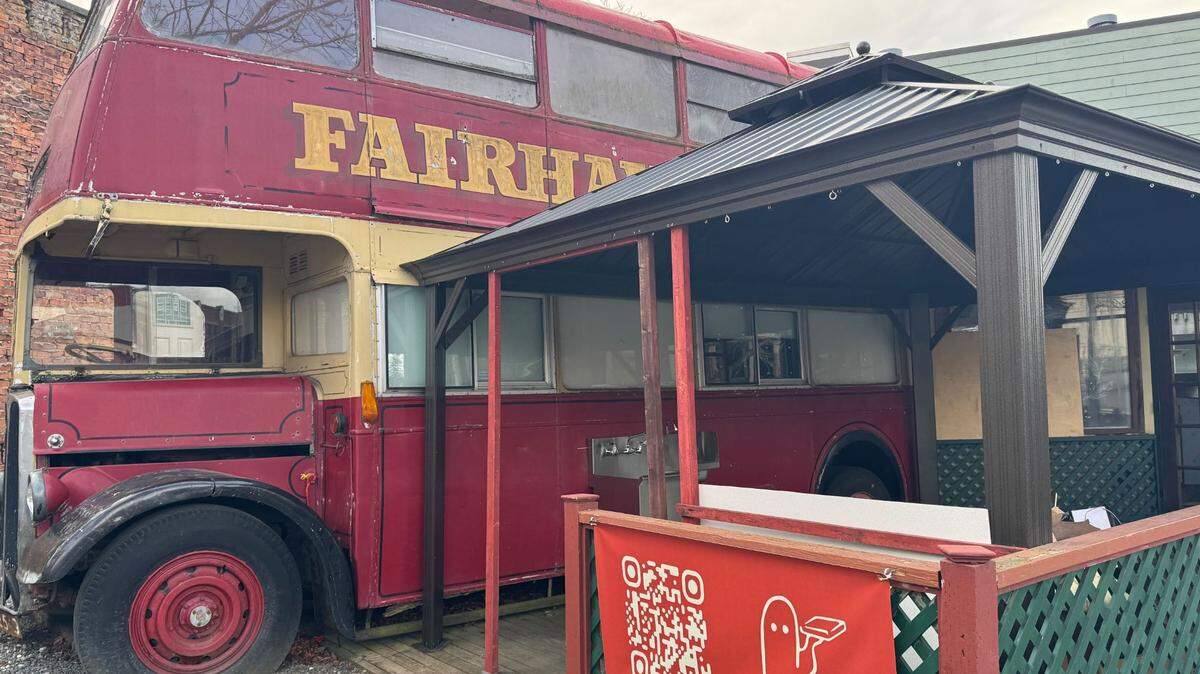 The Fairhaven red double-decker bus with Tam Tam Pizza signs on Feb. 13 at 1020 Harris Ave.