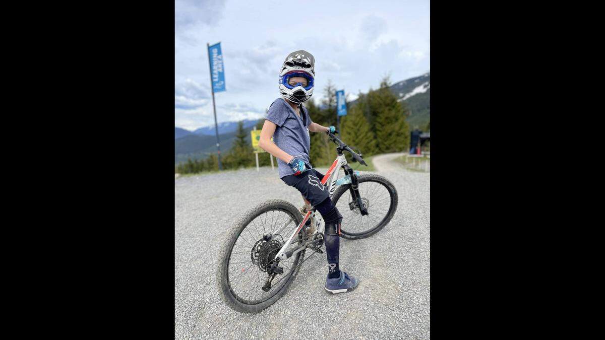 Nora Alexander, daughter of 99 Spokes co-owner Scott Alexander, tries out a Canyon Neuron bike in Whistler, British Columbia, on Wednesday, June 1. The Bellingham-based company is an online marketplace for those looking for more information on bikes.
