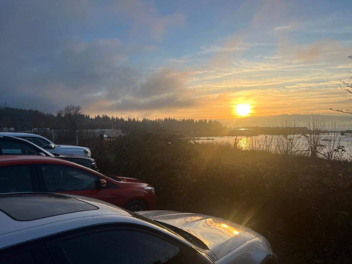 Cars are parked along 10th Street at the site of a proposed luxury residential and commercial development near Taylor Dock on Jan. 6 in Bellingham.