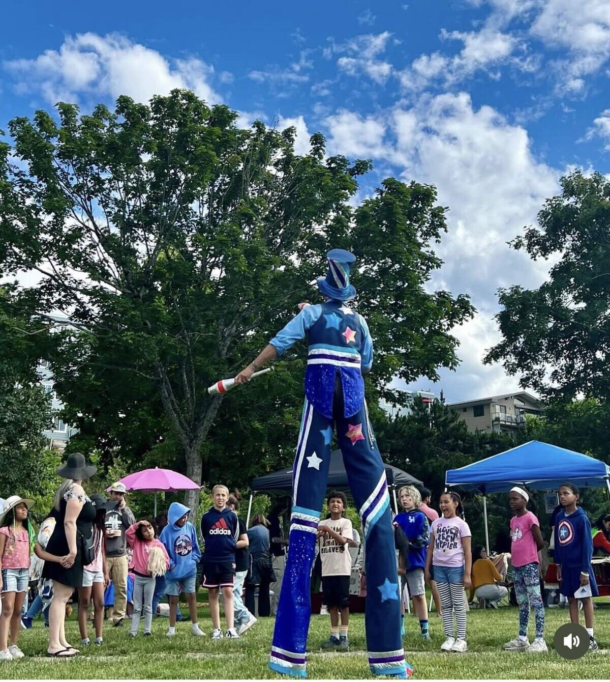 A stilt walker wows the crowd during last year’s celebration.