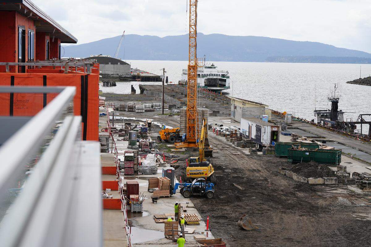 A view from the penthouse balcony in Harcourt’s first luxury residential condo building shows ongoing construction of the second and third residential buildings.
